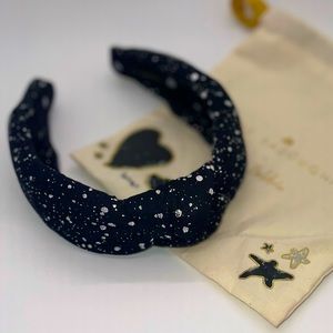 Lele Sadoughi x Hilaria Baldwin headband black with silver paint accents.